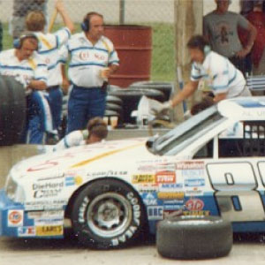 John Suggs, team manager for Buddy Baker, during pit stop at race