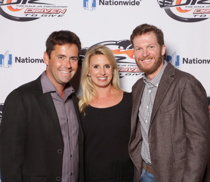 Brandon Suggs and Jill Suggs with Dale Earnhardt Jr. at Driven to Give charity event