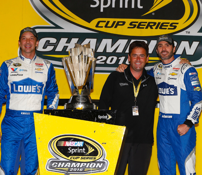 Brandon Suggs with Jimmie Johnson and Chad Knaus in Victory Lane