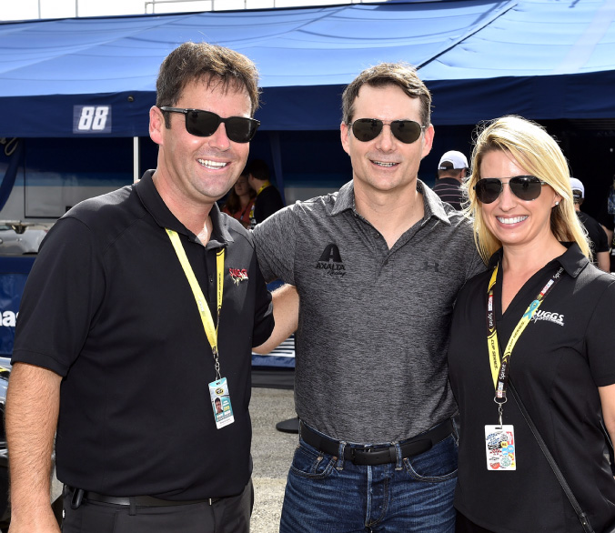 Members of the Suggs Sports Marketing team with Jeff Gordon during pre-race